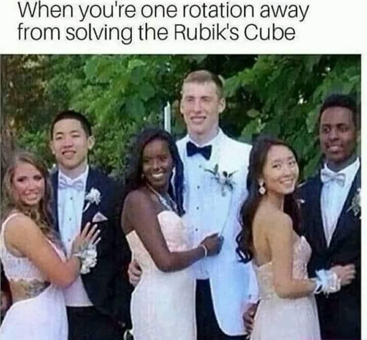 a group of people standing next to each other people